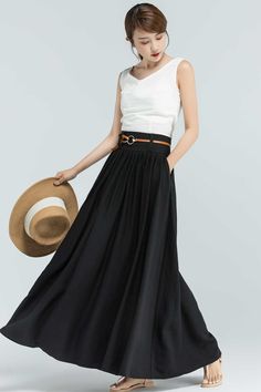 "This Black maxi skirt is the perfect piece for your wardrobe. The Linen skirts is perfect for an afternoon in the city or a walk in the country, the vintage skirt in a wonderful staple, this long skirt will match a variety of ensembles and makes this a must-have. For a twirl-worthy look, pair it with a white blouse or chunky knit sweater and you'll look stylish wherever you're going. Numerous pleats make this a roomy and comfortable skirt. DETAIL * 50% linen ,50% cotton * No Lining * Pleated wa Pleated Maxi Skirt Outfit, Long Linen Skirt, Maxi Skirt Outfit, Rok Outfit, Green Maxi Skirt, Maxi Skirts Summer, Outfit For Summer, Comfortable Skirts, Maxi Rok