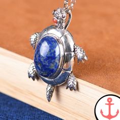 Experience the Underwater Magic with the Blue Sea Turtle Pendant Are you a passionate lover of the sea and all its enchanting creatures? Then our Blue Sea Turtle Pendant is the perfect accessory to show off your love for the deep blue. Made of high-quality materials and designed with precision, this pendant allows you to carry a piece of the ocean wherever you go. The Blue Sea Turtle Pendant is part of our Sea Turtle necklace collection, which showcases the graceful movements and captivating bea Nickel Free Ocean-inspired Pendant Jewelry, Nickel-free Ocean-inspired Pendant Jewelry, Ocean-inspired Round Pendant Jewelry Gift, Ocean-inspired Jewelry With Round Pendant For Gift, Ocean-inspired Round Pendant Jewelry For Gift, Blue Amulet Necklace With Large Pendant, Blue Pendant Jewelry With Lobster Clasp, Blue Necklace With Large Pendant For Gift, Blue Metal Jewelry For Beach