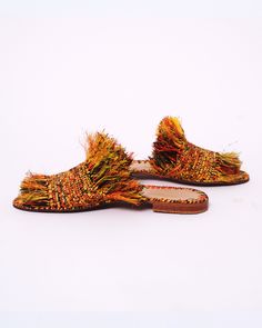 Woven Straw Slip-on Sandals, Orange Closed Toe Mules For Summer, Spring Woven Open Toe Mules, Summer Multicolor Flat Heel Mules, Summer Orange Closed Toe Mules, Brown Woven Straw Sandals, Brown Bohemian Woven Sandals, Bohemian Woven Leather Sandals For Beach, Bohemian Woven Leather Beach Sandals