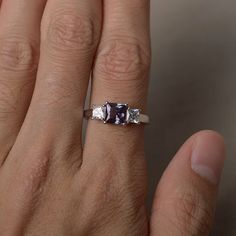 This is a gorgeous handmade creation. Its beauty is its simplicity & Elegance. The 6*6 mm princess cut faceted lab Alexandrite is crafted in solid sterling silver and with rhodium plated. All item is sent in a beautiful gift box If you have any idea of design your ring,pls contact me directly. You can realize more lovely stuff clicking the link https://www.etsy.com/shop/knightjewelry?refshopsection_shophome_leftnav Please leave the correct address and you phone number for delivering successf Asscher Cut Gemstone Promise Ring, Radiant Cut Sapphire Promise Ring, Promise Rings With Asscher Cut Diamond, Princess Cut Crystal Ring With Accent Stones For Promise, Princess Cut Diamond Ring As Gift, Prong Set Sapphire Square Cut Rings, Gift Square Cut Sapphire Ring With Prong Setting, Promise Princess Cut Birthstone Ring, White Gold Sapphire Ring With Square Cut