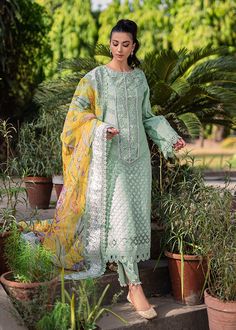 Mint Green Pakistani Dress in Salwar Kameez Style is an elegant masterpiece that gives you your desired dreamy appearance on a festive occasion. Embroidery work and lavish designs on this beautiful Salwar Kameez make it an exquisite choice for the big day. Kameez: The mint-colored kameez comes in textured organza fabric. Beautiful embroidery work and floral designs give a mesmerizing look to the kameez. The kameez is paired with a cotton silk slip. Intricate designs and fine details make this ka Salwar Kameez Style, Green Pakistani Dress, Kameez Style, Salwar Kameez Pakistani, Saira Shakira, Indian Salwar, Indian Salwar Kameez, Pakistani Dress, Organza Fabric