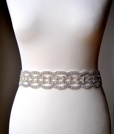 "Wedding Belt, Bridal Belt, Bridesmaid Belt, Bridesmaid Belt, Crystal Rhinestone Ready to ship Luxury high sparkle Clear Rhinestone Crystal Silver sash. Beautiful bridal , party or any special occasion rhinestone sash. Glamour and stylish. Unique and romantic. Perfect for your outdoor, rustic, or shabby chic country wedding. Great for a bride or bridesmaid, flower girls. Made of - stunning clear rhinestone crystal silver trim, all high sparkle different size crystal rhinestones - 18 inches - 45c Wedding Dress Sash Belt, Belt Wedding Dress, Bridesmaid Belt, 2nd Wedding Dresses, Bridesmaid Sash, Empire Wedding Dress, Wedding Dress Sash, Wedding Dress Belt, Couture Wedding Gowns