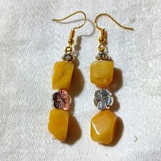 These Are Beautiful, Handmade, Yellow Adventurine Earrings. They Are Dangle Style And Measure Approximately 1 3/4"X 1", So They Hang Down Even Longer Due To The Earring Style. They Are Made With Real Stone And Silvery Beads. I Hope You Like Them And Thanks For Stopping By. Feel Free To Leave Me A Fair Offer. :) Nickel Free Yellow Beaded Earrings For Gift, Yellow Dangle Earrings For Jewelry Making, Yellow Beaded Earrings For Pierced Ears As Gift, Yellow Beaded Drop Earrings As Gift, Yellow Beaded Earrings For Gift, Yellow Dangle Jewelry With Matching Earrings, Yellow Drop Beaded Earrings As Gift, Yellow Dangle Earrings For Gift, Elegant Yellow Beaded Earrings For Gift