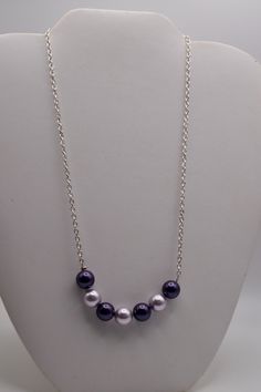 "Everyone loves pearls!  Purchase this one of a kind pearl and sterling silver necklace.  It is 18\"  in length and has 7 pearls all 8mm-10mm in dimension." Purple Pearl Drop Necklaces, Purple Single Strand Pearl Necklace, Purple Pearl Single Strand Jewelry, Purple Pearl Necklace With Pearl Pendant, Purple Single Strand Pearl Jewelry, Purple Pearl Necklaces With Round Beads, Purple Round Beads Pearl Necklace For Gift, Purple Pearl Single Strand Necklace, Purple Pearl Chain Necklace As A Gift