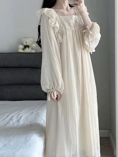 This elegant Coquette Lace Nightgown is crafted from a luxurious blend of fabrics for a comfortable and stylish fit. The all-over lace pattern is subtly sheer for a delicate and feminine look. Its adjustable straps, buttons, and drawstring waist make it the perfect nightgown for a perfect night’s sleep. Lace Sleeping Gown, Victorian Pajamas Nightgowns, Nightgown Drawing Reference, 1700s Nightgown, Korean Night Gown, Royal Sleeping Gown, Victorian Era Nightgown, 1840s Nightgown, 18th Century Nightgown