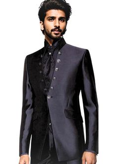 Attractive look reception 1 Button tuxedo suit - 6pc (Jacket, Vest, Pants, Shirt, Tie, Brooch) made from black color polyester fabric. It has bottom as trouser.  Perfect for weddings,graduation ceremoney,dating, meeting, yacht party, banquet, hosts' wearing,etc Dry clean only; Made in India Tailored Party Wear Blazer For Semi-formal Occasions, Black Tuxedo For Groom Festive Occasion, Designer Black Tuxedo For Groom, Festive Black Tuxedo For Groom, Festive Black Blazer For Groom, Tuxedo Style Party Blazer In Suiting Fabric, Elegant Black Unstitched Suit For Groom, Black Fitted Bandhgala For Semi-formal Occasions, Festive Black Blazer With Suit Collar