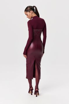 Our stretchy faux leather midi dress is a winter essential. Features a tube design with a straight neckline and a body-con finish. Back zipper closure makes it simple to put on. Style with our amazing boots and coats to create must-have outfits. Vegan Leather Collection Import Self: 60% PU, 35% Rayon, 5% Spandex Lining: 80% Nylon, 20% Spandex Model wears size XS True to size Leather Dress Outfit Night, Leather Dress With Boots, Midi Dress With Jacket, Leather Dress Long, Leather Dress Outfit, Tube Midi Dress, Leather Midi Dress, Dress With Jacket, Tube Design