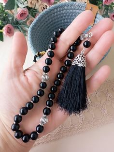 "♥♥This is a masbaha / rosary with 33 Onyx stones and beads. Perfect as \"worry beads\" or Islamic prayer necklaces. * Details * * Gemstone: Onyx * Beads: 33 Pieces * Bead Size: 8 mm ♥♥We ship quickly and safely.  Add your phone number in the address box for a smoother delivery. This makes the job of cargo personnel easier. ♥♥ Note: For International orders, including shipments to Canada: We recommend that you check the customs and duty rules of your country before purchasing. As a seller located in the US, we are not able to predict whether or not duties will be charged nor the amount. The cost of duties and taxes is solely the responsibility of our customers. Please contact us before placing your order if you need any special services or have questions regarding our shipping policies." Worry Beads, Islamic Prayer, Onyx Bead, Onyx Stone, Prayer Beads, Rosary, Black Onyx, Phone Numbers, Phone Number