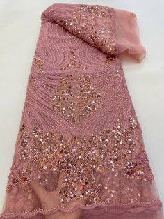 This high quality Fabric is measured in 5 Yards With Embroidered Beading and Sequin. It is soft, very delicate and beautiful. This high Quality Fabric is made with Fashion embroidered rhinestones can be used in making party wedding dresses, skirts, shawls, scarves and other other fashion apparels as you would like. Size : Length : 5 yards (180 inch). Width: 50 inch (Please allow slight deviation for the measurement data ,±1 inch) Material: 100% Polyester, Tulle Lace Fabric, Eco-Friendly embroide Pink Sequin Lace Fabric With Pearl Embroidery, Pink Lace Sequin Fabric With Pearl Embroidery, Pink Pearl Embroidered Lace Sequin Fabric, French Lace Wedding Dress, Color Durazno, Sewing Wedding Dress, Beaded Lace Fabric, Nigerian Lace, Beads Embroidery