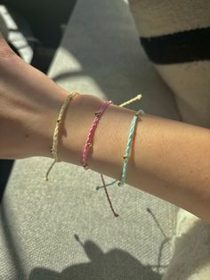 Thank you for clicking on this shop!  These bracelets are 18k plated so you can wear them anywhere!  They also are adjustable, so you can slip them on and off to your liking.  They are great for wearing alone or layering with other bracelets, like my bestselling WAX CORD BRACELET listed in my shop. if you have any questions at all, please message me and ill be happy to help! xx, bea INSTAGRAM:designedbybeaco TIKTOK:designedbybea EMAIL:designedbybeabusiness@gmail.com Adjustable Gold Friendship Bracelets With Colorful Beads, Trendy Gold Friendship Bracelets With Colorful Beads, Trendy Gold Beaded Bracelets With Colorful Beads, Adjustable Yellow Gold Braided Bracelet For Everyday, Trendy Gold Braided Bracelet With Sliding Knot, Trendy Adjustable Braided Bracelet With Tiny Beads, Friendship Bracelets With Colorful Beads As Gift, Gold Friendship Bracelets With Colorful Beads As Gift, Gold Friendship Bracelets With Colorful Beads