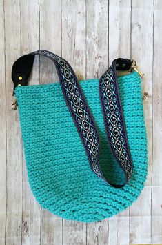 This crochet crossbody bag is large and strong, so it is perfect as a shopper bag or summer beach bag. Woven shoulder bag is also useful for Mothers as a diaper bag. Size: width is 35cm (13,78 in) Height is 40 cm (15,75in) Washing: bag can be washed in the washing machine on 40oC gentle cycle. Do not tumble dry, not bleach,not iron or dry clean. Fabric: polyester rope. It has the Oeko - Tex Standard 100 certificate. *I try to reflect the original colors as accurate as possible still due to diffe Trendy Hobo Crossbody Bag For Travel, Trendy Crossbody Hobo Bag For Travel, Bohemian Crochet Bucket Bag With Leather Handles, Bohemian Shoulder Bag With Removable Pouch For Vacation, Trendy Handmade Hobo Bag For Everyday, Bohemian Hobo Bag With Braided Double Handles, Trendy Travel Hobo Bag With Single Shoulder Strap, Trendy Hobo Bag With Single Shoulder Strap For Travel, Bohemian Crossbody Bag Strap For Everyday Use