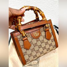 This Bag Is New & Never Worn . It’s A Beauty Bag With Gg Motifs Crystal With Leather. The Measurement -Handle Drop: 7.5cm / 3in -Depth: 9.5cm / 3.7 In -Max.Strap Length: 97cm/ 38.2in -Height : 16cm/ 6.3in -Width : 20cm / 7.9in -The Bag Is Brown And Beige Canvas-Jacquard, Brown Leather (Calf) Gucci Diana, Gucci Outfits, Leather Satchel Handbags, Brown And Beige, Satchel Handbags, Gucci Bags, Beauty Bag, Leather Satchel, Fit Check