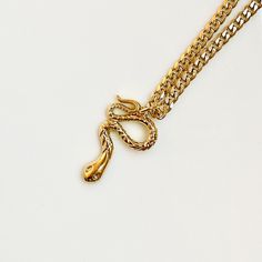 This Snake Necklace represents growth from the past and strength. This is a great gift to a loved one or for yourself to represent the journey you have been through! Ranked one of the hottest necklaces online. 14k Gold Filled Chain length 18” Charm size 1" Does not rust or change color Hypoallergenic Please note that chemical and perfume can shorten the life span Clean your jewelry after each wear with YUMIYU Pouch Waterproof Email support@yumiyujewelry.com for custom orders :) Orders ship in 3- Symbolic Snake Shaped Necklace For Gift, Symbolic Snake-shaped Necklace For Gift, Symbolic Snake Necklace As A Gift, Snake Chain Necklace For Gift, Spiritual Snake Shape Necklace As Gift, Spiritual Snake-shaped Necklace For Gifts, Snake Chain Jewelry As Gift, Spiritual Gold Snake Necklace, Tarnish Resistant Snake Shape Necklace As A Gift