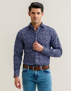 If you desire to add a graceful floral print to your wardrobe, this shirt is the right choice. We have crafted it from a soft, breathable bamboo blend that offers a luxurious feel against your skin while ensuring moisture-wicking properties. A button-up collar effortlessly helps you dress up this shirt for a formal look and dress it down for a relaxed vibe. Flowery and leafy pattern spreads all over the shirt and cobalt blue on a dark blue base adds elegance with style. Easy care bamboo blend fa Floral Pattern Shirt, Polo Fashion, Mens Dress Shirts, Check Shirts, Polo Design, Maroon Shirts, Blue Floral Pattern, Pattern Shirt, Mens Dress