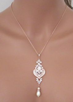 Rose Gold Crystal Necklaces For Wedding, Elegant Sparkling Rose Gold Necklace, Elegant Sparkling Rose Gold Necklaces, Rose Gold Cubic Zirconia Necklace With Sparkling Stones, Delicate Rose Gold Diamond Necklace For Wedding, Rose Gold Crystal Bridal Necklace Gift, Wedding Rose Gold Dangle Necklaces, Rose Gold Crystal Bridal Necklace, Rose Gold Diamond Necklace With Flower Pendant For Wedding