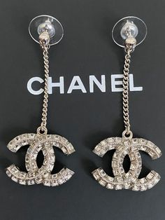 NIB Chanel Iconic Large CC Logo Crystal Chain Charm Silver Tone Drop Earrings Blonde Hair Red Lips, Moriarty Sherlock, Chanel Pins, Wesleyan University, Chanel Women, Chanel Brooch, Chanel Chain, Chanel Earrings, Diamond Brooch