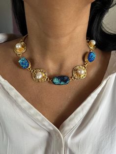 This premium quality, handmade statement necklace is crafted with the finest brass and features a stunning designer setting of Druzy Rainbow stones. Weighing 50 grams, and a Lobster Claw closure, size is adjustable, it sits comfortably on the neck. Perfect for most outings and ceremonies, it's guaranteed to stand out and attract lots of compliments. Length of the Necklace: 16 inches Handmade Statement Necklace, Collar Necklace, Charm Necklaces, Druzy, Lobster Claw, Charm Necklace, Necklace Etsy, Statement Necklace, Jewelry Necklaces