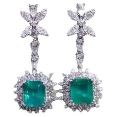 A pair of Emeralds and Diamonds , an exquisite display of elegance. This stunning combination creates a captivating piece that enhances any ensemble with its luxurious and sophisticated allure. Adds a touch of elegance and class on your look. Magnificent earring come in 18k gold with two pieces of Natural Zambian Emeralds, fine quality, vibrant color, in perfect cut, of 9,00 carats, and 98 pieces of Natural Diamonds, of 4,00 carats, F color VS clarity, very sparkly. Handcrafted by artisan goldsmith. Extremely high product. Shop with Confidence. We offer worldwide shipping , taxes free on my shipment. 18k Gold Earrings, Zambian Emerald, Zambia, Dream Jewelry, Chandelier Earrings, Two Pieces, Natural Diamonds, Gemstone Jewelry, Gold Earrings