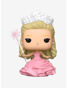 a pop vinyl figure wearing a pink dress and tiara holding a wand with her hand