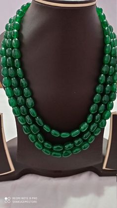 Emerald 963 Carat AAA Quality emerald beryal gemstone tumble gemstone beads adjustable cord Stone : emerald beryl Shape -smooth tumble Necklace -Approx 20 inch 3 line string Size :- Approx 10x12mm to 10x14mm Weight :- 963 carat Polish :- Handmade color - green makes a great gift for your loved ones. It is known as the 'love stone' as the message it emits is the strong vibration of unconditional love, joy, warmth and healing. As quartz crystals are profound amplifiers of energy, it may help to ki Traditional Green Beads For Jewelry Making, Emerald Necklaces With Natural Stones In Round Beads Shape, Emerald Beaded Necklaces With Natural Stones, Handmade Emerald Beaded Necklaces With Round Beads, Traditional Green Gemstone Beads, Green Oval Gemstone Beads Jewelry, Green Oval Polished Beads Jewelry, Traditional Green Gemstone Beads And Cabochons, Polished Emerald Beaded Necklaces