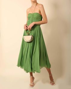 For Sale on 1stDibs - Chloe Spring Summer 2004 strapless plisse green silk dress Boning to the upper portion Cinched in waist Long rope ties with beaded ends wrap around the Summer Cocktail Strapless Pleated Dress, Green Strapless Dress For Spring, Elegant Green Strapless Dress For Spring, Spring Silk Strapless Dress With Pleated Bodice, Summer Evening Strapless Pleated Dress, Spring Bandeau Dress With Pleated Bodice, Spring Strapless Mini Dress With Pleated Bodice, Green Strapless Evening Dress For Spring, Green Strapless Dress With Pleated Bodice