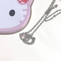 Description:Dainty CZ Inlaid Kitty Pendant NecklaceSpecifications:Material: cubic zirconia. copper. enamel. 18k white goldColors: silverSize: 40 cm + 5 cm extWeight: 4.3 g/pcsFeatures & Details:Material: This dainty crystal kitty pendant necklace is made of environmental friendly materials. which is solid. durable. lightweight and very comfortable and healthy for daily wear. Stylish design: The shiny. durable and comfortable crystal kitty necklace shows the smooth surface of the jewelry that is laying flat on you for an elegant look. Ocassions: It is easy to match your different outfits and also suitable for any occasions like wedding. banquet. costume party. engaged party. prom. anniversary. holiday. evening party or other social events. where let you look elegant. attractive and fashiona Kitty Necklace, Wedding Banquet, Cat Pendants, Enamel Bracelet, Just A Reminder, Cat Necklace, Environmental Friendly, Different Outfits, Social Events