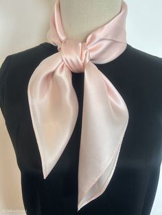 "Luxurious light Sakura pink natural mulberry silk medium square scarf, size: 65 cm x 65 cm / 26 in x 26 in. Soft, smooth, and lustrous silk charmeuse fabric, breathable and skin-friendly feels very soft and comfortable to wear. Can wear it on both sides which will give different feel and look. Can style in many ways: can wear this scarf as a soft neck scarf, as a hair tie, as a headband scarf, as a wrist scarf, as a purse accessory. Or style it in any way you want with your own sense of creativity! Suitable for all seasons and is a great gift idea for special occasions.  Care Instructions: Pure silk is a type of organic, natural and delicate fabric, please avoid washing if it's not particularly dirty. Gently hand wash cold/lukewarm with mild detergent, natural air dry. Stored in a cool, d Pink Silk Scarf For Spring Formal Events, Pink Silk Scarf For Formal Spring Occasions, Pink Silk Scarf For Formal Spring Events, Light Pink Fashion, Baby Pink Silk, Pink Silk Scarf, Headband Scarf, Plain Scarves, Simple Scarf