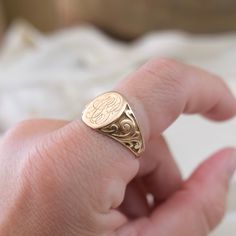 Discover a little signature love with this 10k antique solid gold original vintage signet ring from the late 1800s. In the original signet ring design this beauty is timeless - traditionally representing the confirmation of personal identity, dating back to the Romans, this ring features intricate family initials which we believe to be SAB or LAS. This sweet antique ring with remind you to always love yourself for who you are * Size 9 * 10k solid gold * can be resized * Item is available for lay Antique Oval Signet Ring For Gift, Oval Antique Signet Ring As Gift, Antique Signet Ring As Gift, Victorian 14k Gold Signet Ring With Initials, Antique Yellow Gold Signet Ring, Victorian Gold Signet Ring With Initials, Antique Personalized Signet Ring For Anniversary, Antique Hallmarked Signet Ring, Victorian Style Signet Ring With Intricate Design