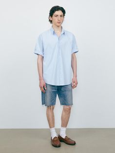 The shirt features oversized fit, rolled up sleeves, and double placket. The shirt is finished with bio-washing, which minimizes fabric shrinking. The oversized fit design makes natural silhouette and comfy fit for daily outfit.- Oversized fit- Button closure- Round hem- Basic item Relaxed Button-up Shirt With Rolled Sleeves, Blue Shirt With Roll-up Sleeves And Shirttail Hem, Collared Shirt With Rolled Sleeves For Everyday, Everyday Collared Shirt With Rolled Sleeves, Relaxed Fit Shirt With Roll-up Sleeves For Daywear, Cotton Shirt With Roll-up Sleeves And Shirttail Hem, Blue Oversized Shirt For Everyday, Shirt With Rolled Sleeves And Shirttail Hem, Everyday Shirt With Rolled Sleeves And Shirttail Hem