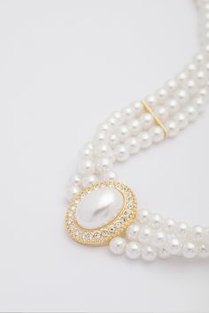 This sumptuous piece of jewelry features a retro-elegant yet slightly modern style that complements the lavish garments, reminiscent of the roaring 1920s. Features: Multi layer imitation pearls Shimmering rhinestone studded Pearl size: 8 mm in diameter Long pearl necklace length: 59 inch / 150 cm Elegant Party Jewelry With Pearl Buttons, Elegant Beaded Crystal Pearl Necklace, Elegant Pearl Necklace With Rhinestones For Formal Occasions, Elegant Crystal Pearl Necklace For Party, Elegant Formal Pearl Necklace With Rhinestones, White Pearl Necklace With Rhinestones For Formal Occasions, Formal White Pearl Necklace With Rhinestones, Formal Pearl Necklace With Rhinestones, Elegant Pearl Necklace With Crystal Rhinestones