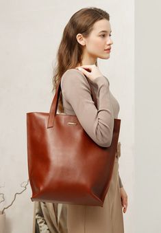 Urban large light brown terracotta shopper bag fashion trend autumn winter 2022/2023 made of leather is always relevant and will suit any wardrobe of a modern girl Bags 2023 Trends, Men's Backpacks, Leather Shopper Bag, True Autumn, Inside My Bag, Oversized Tote, 2023 Trends, Big Bags, Bag Shoes