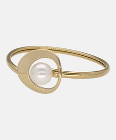 Elevate your style with our Petra Collection bracelet - a luxurious bangle crafted with a 46x58mm gold-plated steel band and a lustrous 12mm round organic pearl. This elegant piece will add a touch of sophistication to any outfit, making it a must-have for every fashionable woman. Modern Stainless Steel Round Bangle, Modern Gold-tone Bangle With Polished Finish, Hoop Bracelet With Polished Finish As A Gift, Polished Hoop Bangle As A Gift, Formal Metal Bangle Jewelry, Stainless Steel Bangle With Polished Finish, Modern Gold-tone Bangle For Formal Occasions, Modern Gold-tone Formal Bangle, Oval Gold Stainless Steel Jewelry