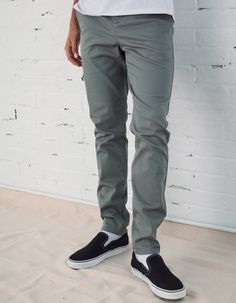 RSQ Skinny Chinos. Formerly known as the "Seattle Skinny Taper Chino Pants". Slant front pockets with welt back pockets and additional decorative pocket with RSQ tag at back left pocket. Approx leg opening: 13.5"(34cm). 97% cotton/3% spandex. Machine wash. Imported.Model is 6'2.5" wearing a size 31x32.Approx outseam: 41"Approx leg opening: 13.5" Casual Fitted Straight Work Pants, Fitted Casual Work Pants, Casual Pants With Button Zip Fly, Casual Full-length Pants With Button Zip Fly, Casual Pants With Button Zip Fly For Everyday, Casual Fitted Pants With Buttons, Fitted Casual Pants With Buttons, Casual Non-stretch Cotton Work Pants, Non-stretch Cotton Casual Work Pants