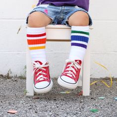 Start your child's journey of self-discovery with a celebration of his or her uniqueness with colorful, fun and bright tube socks! These white retro tube socks are approximately 10 inches and are made to fit BABIES, TODDLERS and KIDS. Expect them to be: -thigh-high for infants -over-the-knee for toddlers 1 to 3 years old -knee-high for kids 3 to 5 years old Our tube socks are made of 75% Ring Spun Cotton, 14% Nylon, 7% Acrylic, 4% Spandex and proudly made in the USA! Pride Socks, Striped Tube Socks, Mismatched Socks, Toddler Converse, Goth Fashion Punk, Emo Dresses, Toddler Socks, Thigh High Boots Heels, Thigh High Socks