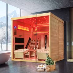 an indoor sauna is shown in the middle of a room with a large window