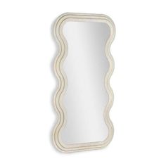 a white mirror with wavy lines on the bottom and sides, against a white background