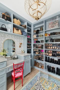 the closet is full of shoes and purses