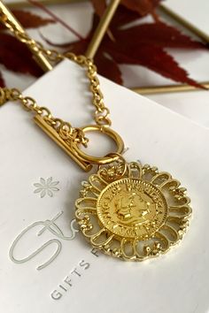 Elegant Gold Coin Necklace Nickel Free, Gold Medallion Necklace With Lobster Clasp, Elegant Gold-tone Coin Necklace, Vintage Gold Metal Coin Necklace, Round Metal Medallion Necklace, Tarnish Resistant, Round Metal Medallion Necklace Tarnish Resistant, Vintage Gold Chain Necklace Nickel Free, Vintage Brass Medallion Necklace Tarnish Resistant, Handmade Gold Coin Medallion Necklace