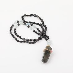 MANIFEST NEW OUTCOMES  💗 Transformation  💗     💗 Intuition  💗   Who said jewelry has to be minimal?  This labradorite point necklace combines a crystal point shape with gemstone beads to create a unique piece  of labradorite jewelry.   MS-LABRADORITE   Due to its unique appearance, Labradorite stone is often cut into cabochons, beads, and other jewelry components .  Wear this labradorite pendant to enhance spirituality and manifest new outcomes.   Product Information: Main Pendant Stone:  Natural Labradorite  Beads:  Black Tourmaline, Aquamarine  Length:  32"  Weight:  0.18 lbs   Color shades can vary on all-natural stones. Please allow for slight variations.   Remember that all-natural gemstones reveal true beauty under direct sunlight.    Please Note : It's essential to cleanse and e Labradorite Crystal Necklaces With Natural Stones For Healing, Labradorite Crystal Necklace With Natural Stones For Healing, Healing Labradorite Crystal Necklace, Spiritual Labradorite Crystal Necklaces For Jewelry Making, Spiritual Labradorite Jewelry With Gemstone Beads, Spiritual Moonstone Crystal Necklace With Gemstone Beads, Spiritual Labradorite Crystal Necklace For Healing, Spiritual Moonstone Beaded Necklace With Natural Stones, Labradorite Gemstone Beads Necklace For Meditation