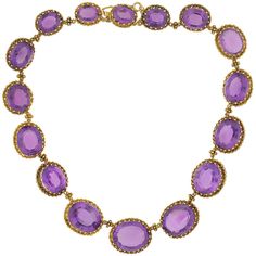 A dramatic and breathtaking amethyst link necklace from the Victorian (ca1880) era! This stunning piece is comprised of 16 faceted amethyst stones resting in an ornate 15kt yellow gold setting. The oval-shaped stones are of exceptional quality, and graduate outward, with the largest stones resting at the center. A gorgeous cannetille wirework border surrounds each prong set stone, and is embellished with fine beadwork that creates a subtle scalloped edge. The stones rest in an open back setting, Overlord Oc, Amethyst Jewelry Set, Amethyst Stones, Black Onyx Necklace, Jewellery Vintage, Citrine Necklace, Coral Earrings, Yellow Gold Setting, Amethyst Jewelry