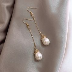 Showcase your sophisticated and elegant style with these stunning earrings. The perfect addition to your wardrobe, guaranteed to steal the show every time you wear them.

S925 sterling silver
Natural pearl
tassel Size:8 cm Short Size:4 cm

Hypoallergenic, lead & nickel free


If you aren't in LOVE with your purchase, please let us know within 30 days of receiving your item, and you'll receive a stress-free refund. Drop Pearl Earrings, Earrings With Pearls, Red Heart Earrings, Reflecting Light, Prom Jewelry, Looks Black, Jewelry Lookbook, Jewelry Wedding, Jewelry Inspo