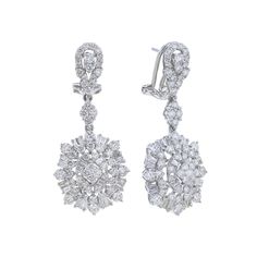 Take your style to new heights with the Alouette Diamond Drop Earrings. These opulent 18 karat gold earrings feature baguette cut and round brilliant diamonds totaling 3 1/6 carats, making them a statement of luxury and elegance. Elevate any outfit and turn heads with these stunning earrings. Luxury Dazzling Diamond White Earrings, Luxury Diamond Earrings With Diamond Eyes, Luxury Baguette Diamond Earrings Round Cut, Diamond Earrings Dangling, Elegant White Gold Diamond Earrings With Baguette Diamonds, Luxury Baguette Cut Diamond Earrings For Formal Occasions, Luxury Formal Baguette Cut Diamond Earrings, Timeless Baguette Diamond Earrings For Formal Occasions, Timeless Formal Baguette Diamond Earrings