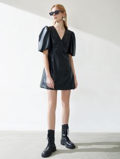 MO&Co. Women's Faux Leather Puff Sleeve Dress Features : - High waist - V neck - A-shaped pendulumCode : MBB1DRS010Length of size M is 81cmBlack : Model is 177cm tall and wearing a size M MATERIALS & CARE : Material : Polyurethane artificial leather Do not wash, do not bleach Hang to dry in the shade Do not tumble dry, do not iron Do not dry clean Wipe with damp cloth onlyPlease select your own size in the size chart according to your figure and serve model size as a guideline. Trendy Black Faux Leather Dress, Leather Dress Street Style, Black Puff Leather Dress Knee Leangth, Black Leather Dress, Black Puff Leather Dress, Black V-neck Puff Sleeve Dress For Work, Black V-neck Puff Sleeve Dress For Night Out, Stretch Leather Dress, Edgy Faux Leather Mini Dress