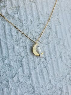 Kitty Cat Moon Necklace Chain Length: 16 1/2" (42.0 cm) + 2" (5.0 cm) Extension Clasp: Yes Type of Clasp: Lobster Claw Pendant Length: 1/2" (1.3 cm) Pendant Width: 3/8" (1.0 cm) Chain Width: 1 mm Weight: 2g Metal: Rhodium or gold plated chains, Rhodium plated pendant, Tarnish resistant Half Moon Metal Necklace For Gift, Half Moon Metal Necklace For Gifts, White Half Moon Jewelry For Gift, Half Moon Metal Jewelry Gift, Layering Jewelry, Cat Moon, Delicate Necklaces, Necklace Rose Gold, Necklace Chain Lengths