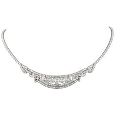 Stunning vintage Art Deco style diamond high jewelry necklace, centered with a marques diamonds. Approximately 10.80 carats of round, marquess, and baguette diamonds. Approximately G/H color and VS clarity. Platinum. Accommodated with an up-to-date appraisal by a GIA G.G. once purchased, upon request. Please contact us with any questions. Item Number N6429 Diamond High Jewelry, High Jewelry Necklace, Vintage Diamond Necklace, Black Gold Necklace, Art Deco Pendant Necklace, Art Deco Jewelry Vintage, Diamond Drop Necklace, Opal Pendant Necklace, Baguette Diamonds