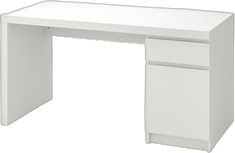 a white desk with two drawers on the bottom and one drawer at the top that is open