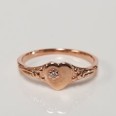 "Thanks for shopping our vintage estate store. We tend to sell well below wholesale and truly hope you enjoy all of our items. Many of the items are one of a kind, so please enjoy scrolling through the pictures and hopefully something will catch your eye. Black spots are from reflections. Estate 14k yellow or rose gold heart diamond ring. Beautiful ring, one that you will love. We also have the white gold ring in listing GS2191 if you need it. Color: Yellow or Rose Gold please select the color R Victorian 14k Gold Jewelry For Valentine's Day, Engraved Rose Gold Diamond Ring For Wedding, Vintage Rose Gold Jewelry For Gifts, Elegant 14k Gold Engraved Ring With Hallmark, 14k Gold Elegant Engraved Ring, Heirloom Engraved Heart Ring, Heirloom Jewelry For Valentine's Day, Classic 14k Heart-shaped Engraved Ring, Vintage Jewelry With Rose Cut Diamonds As A Gift