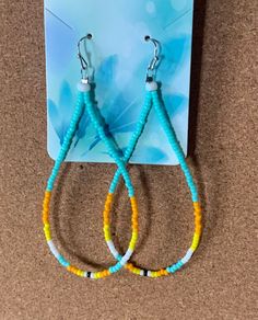 Hand crafted by a Shinnnecock Native American artist, these loop beaded earrings are bright and lightweight. Bloomsburg Pa, Native American Artists, Loop Earrings, Bead Work Jewelry, Work Jewelry, Beaded Hoop Earrings, Beaded Hoops, Beaded Earrings, Bead Work