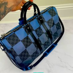 Louis Vuitton Duffel Bag Rare Lv Bag Blue/Black Damier Bag Serious Inquiries Only Designer Travel Bag With Removable Pouch For Shopping, Designer Duffle Bag With Detachable Strap And Top Handle, Designer Travel Bag With Detachable Handle For Daily Use, Designer Rectangular Travel Bag With Removable Pouch, Designer Travel Bag With Detachable Handle, Designer Duffle Bag For Daily Use, Designer Travel Bag With Detachable Strap, Designer Travel Bag With Detachable Strap And Top Handle, Designer Double Handle Duffle Bag