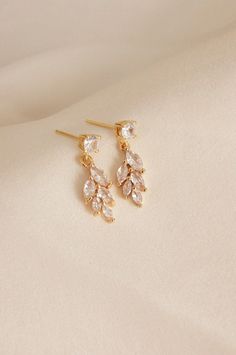 The images are protected by copyright. The high-quality zirconia stones sparkle like diamonds and catch the light beautifully. Each stone has been carefully set into the setting to ensure maximum brilliance and elegance. With their classic design and the perfect combination of gold plating and sparkling zirconia stones, these earrings are versatile. Whether for formal occasions, romantic dinners or simply as a stylish everyday accessory, they will perfectly complement your outfit and give you a 925 Silver Earrings, Everyday Accessories, Romantic Dinners, Gold Plated Earrings, Gold Plating, Jewelry Earrings Dangle, Classic Design, Gold Earrings, Silver Earrings